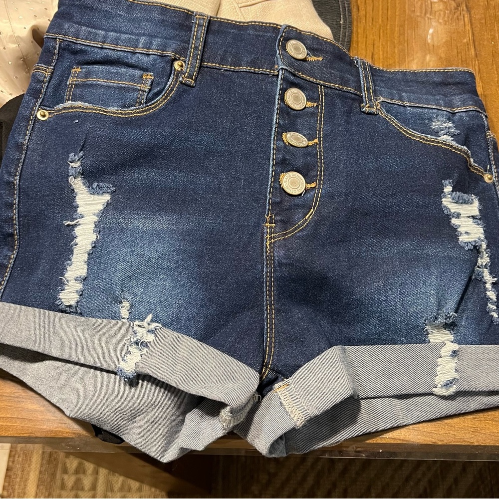 Size small buttoned up jean shorts. NWT